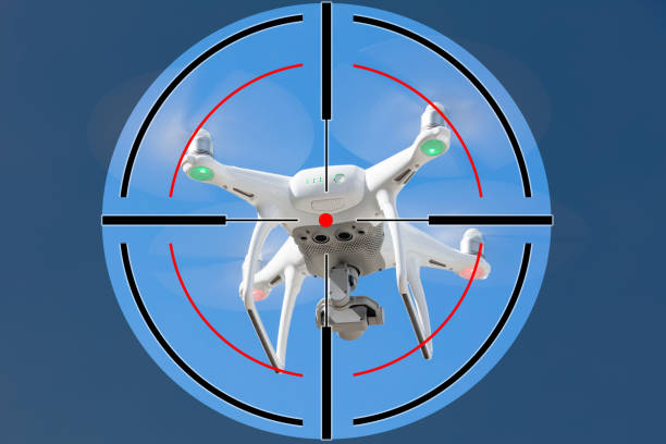 istock Drone flying against clear blue sky 1167402526