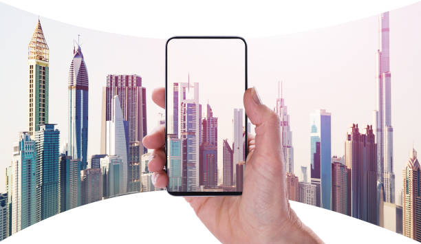 istock Cart Filled With Boxes And Hand Holding Mobile Phone 1167409891