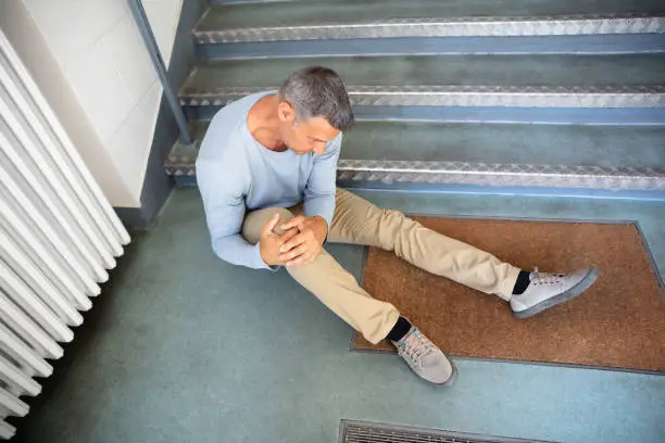 Photo of Mature Man Sitting On Staircase