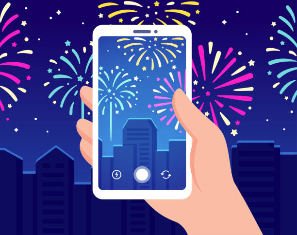 smartphone-aufnahme von feuerwerksvideos - firework display pyrotechnics fourth of july celebration stock-grafiken, -clipart, -cartoons und -symbole