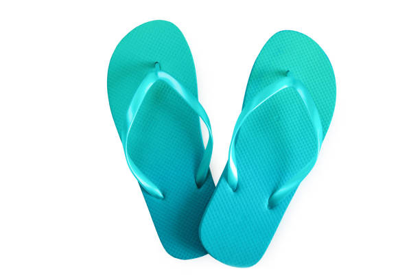 istock Green flip flops isolated on white background. Top view 1167414710