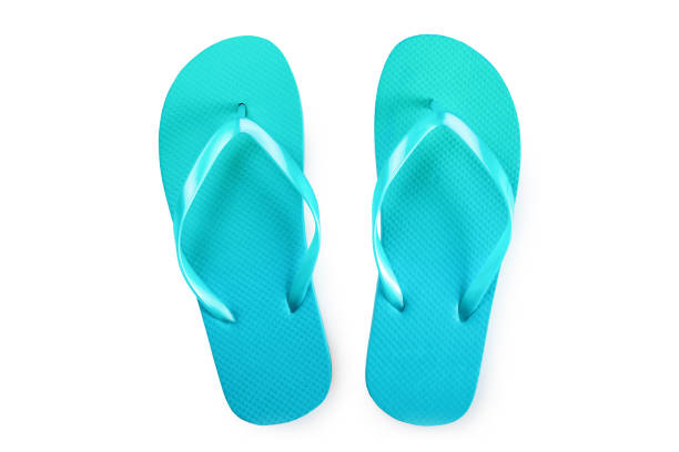 istock Green flip flops isolated on white background. Top view 1167414721
