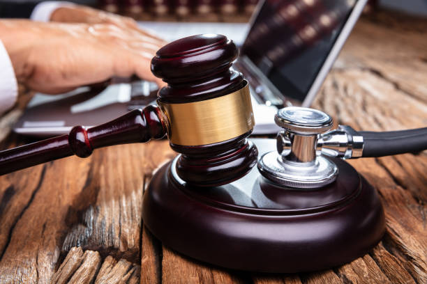 Mallet And Stethoscope On Gavel Over The Office Desk