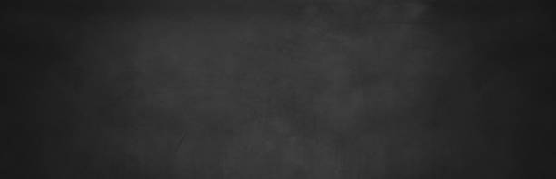 istock dark cement and horizontal black concrete wall 1167418496