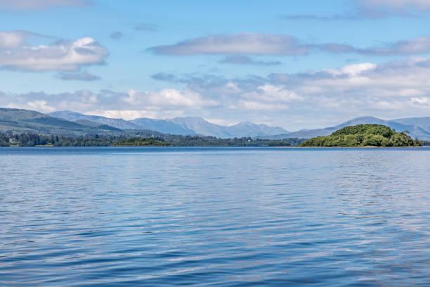 istock Lough Corrib with forest and Conerama mountains in background 1167418507