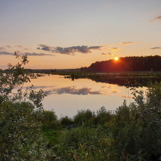 istock sunset on the blue sky over the lake 1167418679
