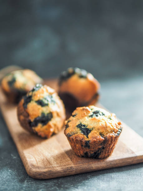 istock Homemade blueberry muffins on dark background. 1167420089