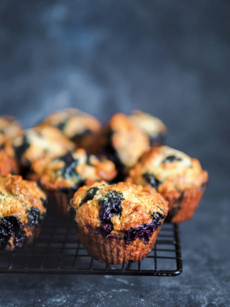 istock Homemade blueberry muffins on dark background. 1167420116