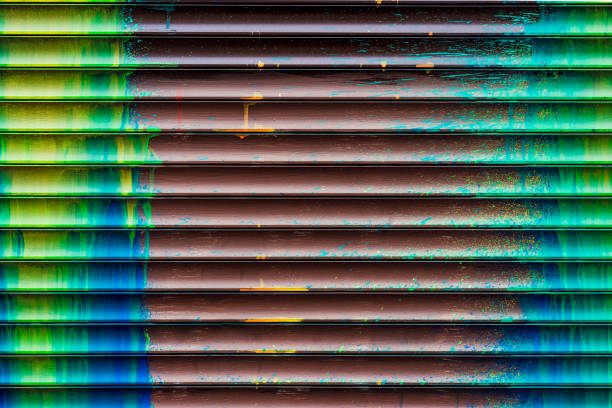 istock Wall with smudges of multi-colored paint. 1167421485