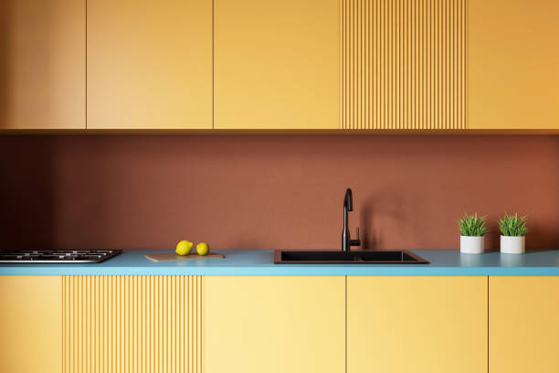 istock Yellow countertops in orange kitchen 1167421538