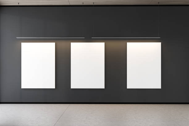 istock Three mock up posters in gray gallery interior 1167422124