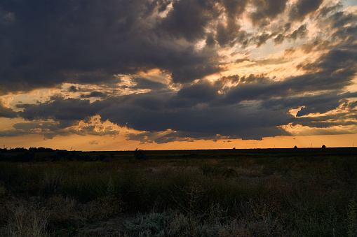 sunset in the steppe, rural landscape