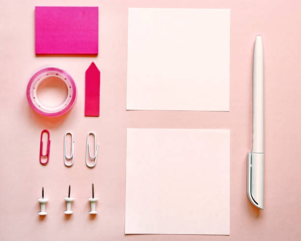 istock Stationery and on a pink background. Place for text. Flat lay, top view 1167423230