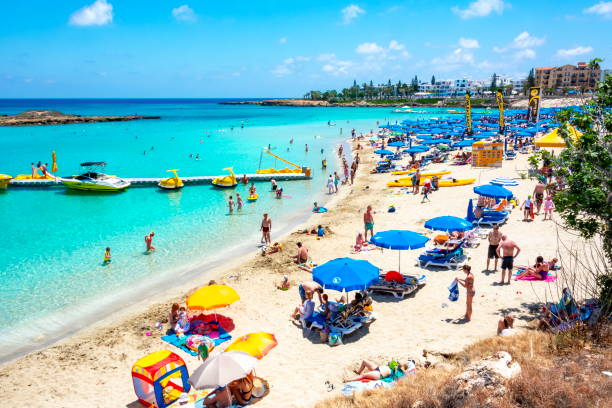 Cyprus - July 2019: People relaxing on Fig Tree bay beach in Protaras