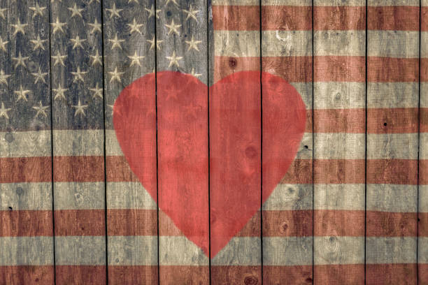 istock vintage american flag with red heart 1167426566