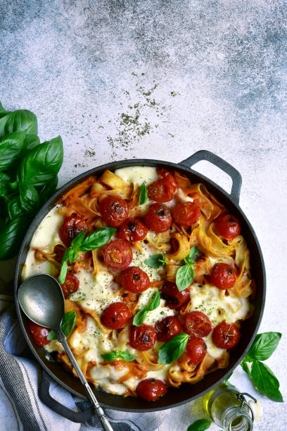 istock Pasta casserole with tomatoes and mozzarella cheese 1167427976