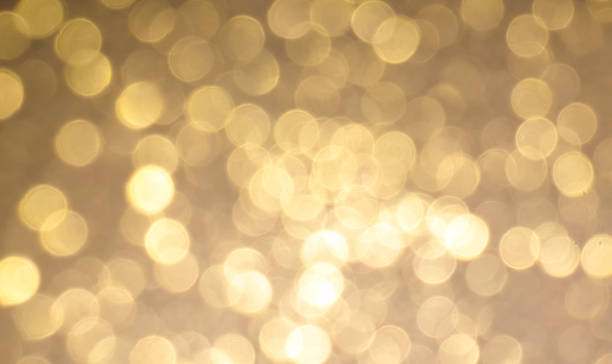 istock Sparkling sprinkles blurred sparkles background wallpaper 1167428078