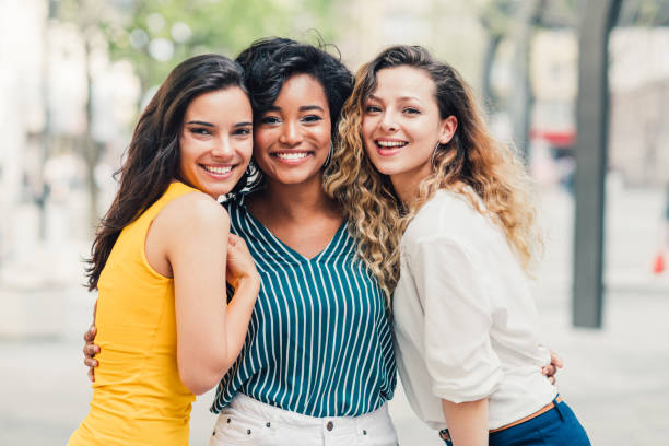 istock Three beautiful smiling girls 1167430344