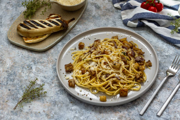 istock Spaghetti with eggplants, parmesan, thyme and pepper. Pasta with eggplants. 1167430491