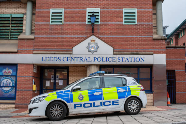 Leeds Central Police Station Police car outside Leeds Central Police Station, West Yorkshire Police police station stock pictures, royalty-free photos & images