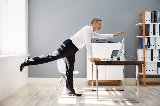istock Happy Businessman Stretching 1167430853