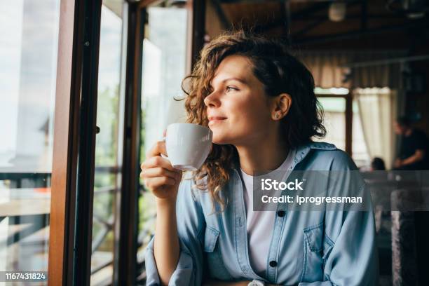 Smiling Calm Young Woman Drinking Coffee Stock Photo - Download Image Now - Coffee - Drink, One Woman Only, People
