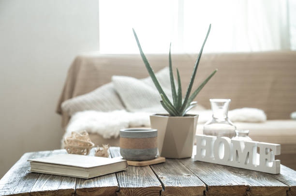 istock Home interior with decorative items on a wooden table. 1167434701