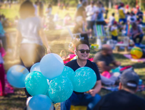 Close-Up Of Turquoise Helium Balloons At Wedding