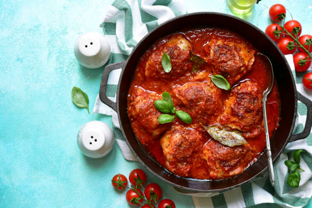 Spicy chiken legacies in a tomato sauce