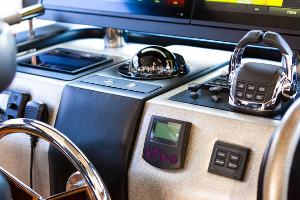 luxury yacht control panel with engine accelerator and compass, background with copy space - throttle industrial ship passenger ship nautical vessel imagens e fotografias de stock