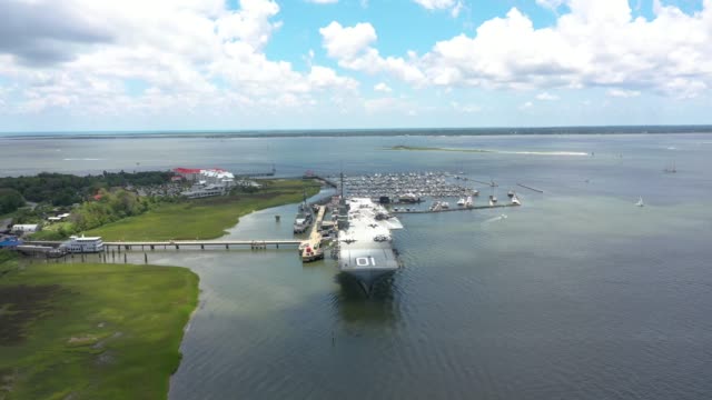 Drone view of decommisioned US Yorktown aircraft carrier in Charleston Harbor, South Carolina.
