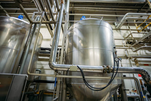 istock Industrial steel vats connected by pipeline 1167447766