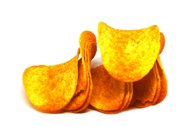 istock potato chips closeup isolated on a white background 1167451447