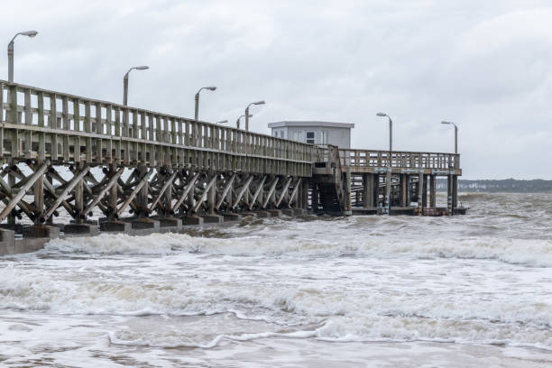 istock beautiful wooden pier on the ocean coast 1167452810