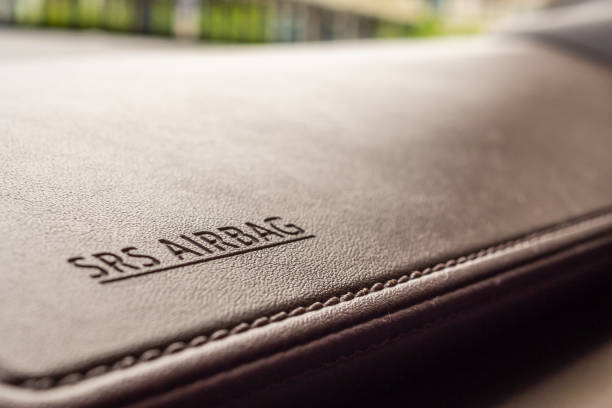 istock airbag safety sign on brown leather texture in modern car 1167452865
