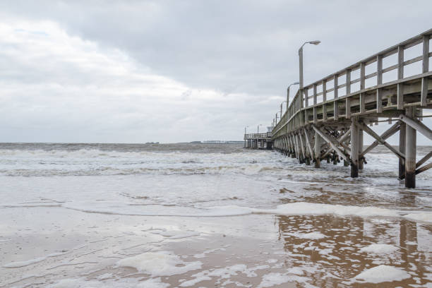 istock beautiful wooden pier on the ocean coast 1167453000