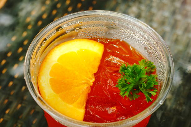 Cold refreshing drink with blood orange slices