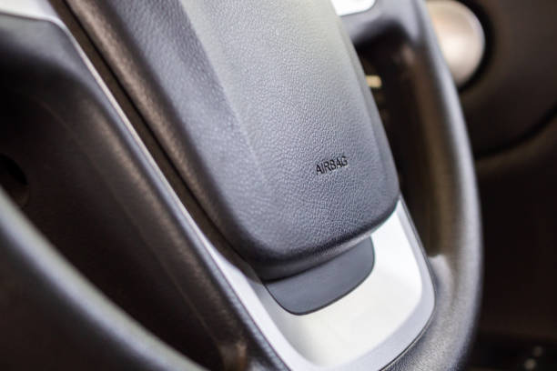 istock Safety airbag sign on car steering wheel 1167453354