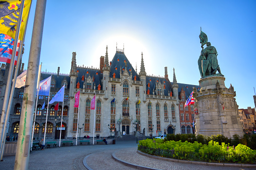 Bruges, Belgium - April 26, 2019 - The Provinciaal Hof (Province Court) is a Neogothical building on the market place in Bruges, Belgium.