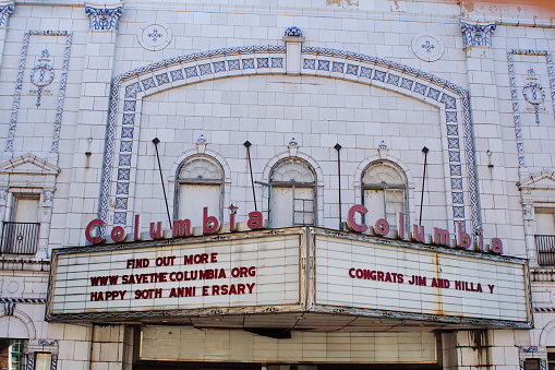 Exterior shot of a retro cinema theater from street