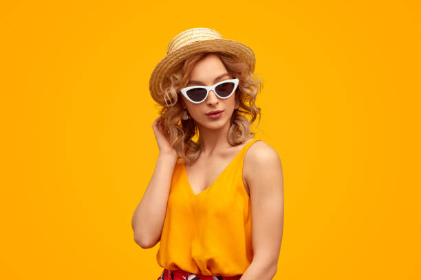 istock Stylish lady in sunglasses and straw hat 1167454939