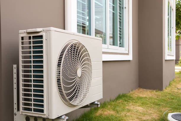 istock Air conditioner compressor outdoor unit installed outside the house 1167455221