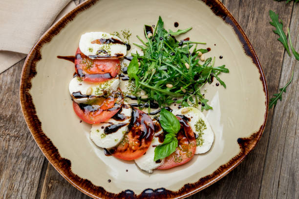 istock Caprese salad with mozzarella and tomato 1167459967