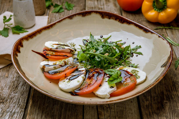 istock Caprese salad with mozzarella and tomato 1167461356