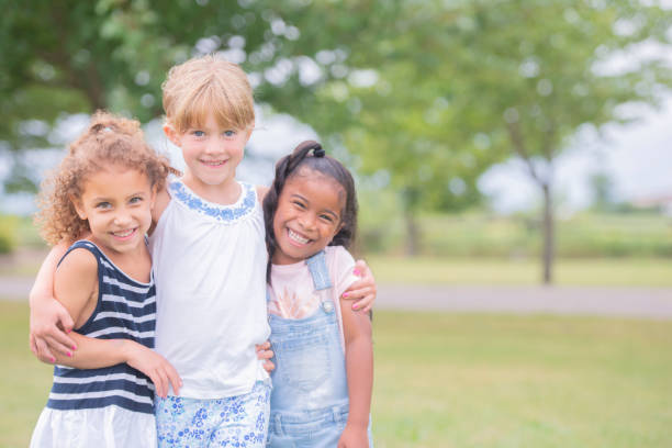 istock Three (3) Adorable Multi-Ethnic Kindergarten Girls Posing 1167464377