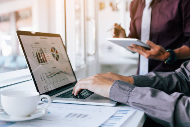 istock Two entrepreneur person working and colleague analyzing data for new start-up business and marketing. 1167467578
