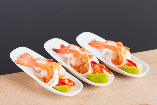 Seafood cocktail shrimp prawn in spicy seafood dip