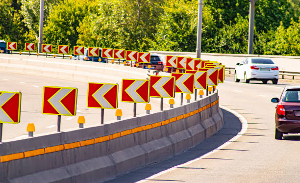 istock Turning a highway with moving cars. 1167484365