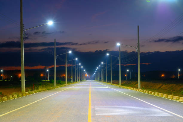 istock Empty Road at night with Electric Power Light 1167489681