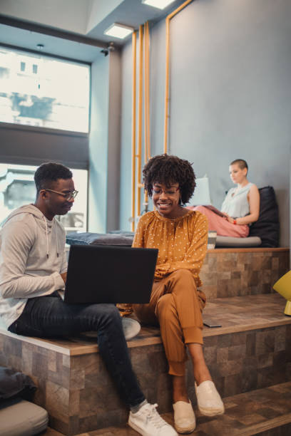 istock Two Young Entrepreneurs Working On Laptop 1167490730